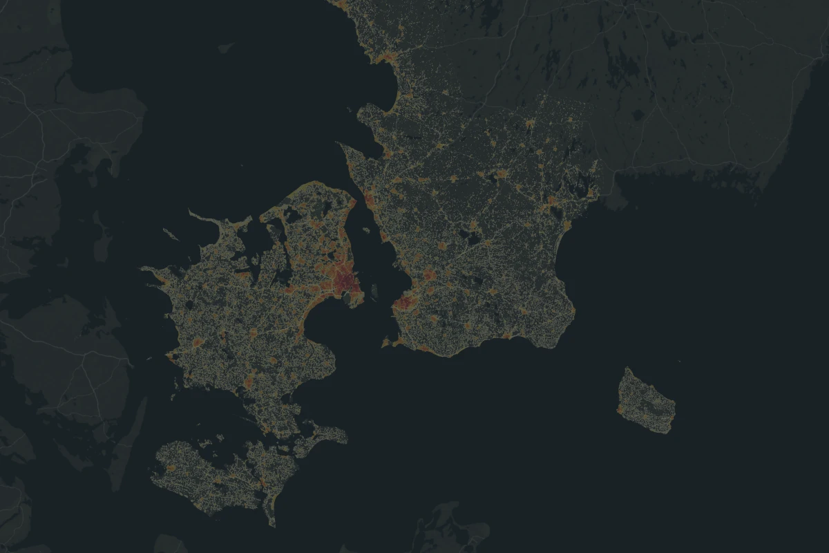 Befolkningsmönster kring Öresund, med Köpenhamn och Malmö i gyllene nyanser på en mörk karta.